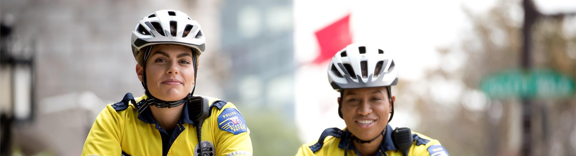 Two Temple University Campus Safety officers on bicycle.